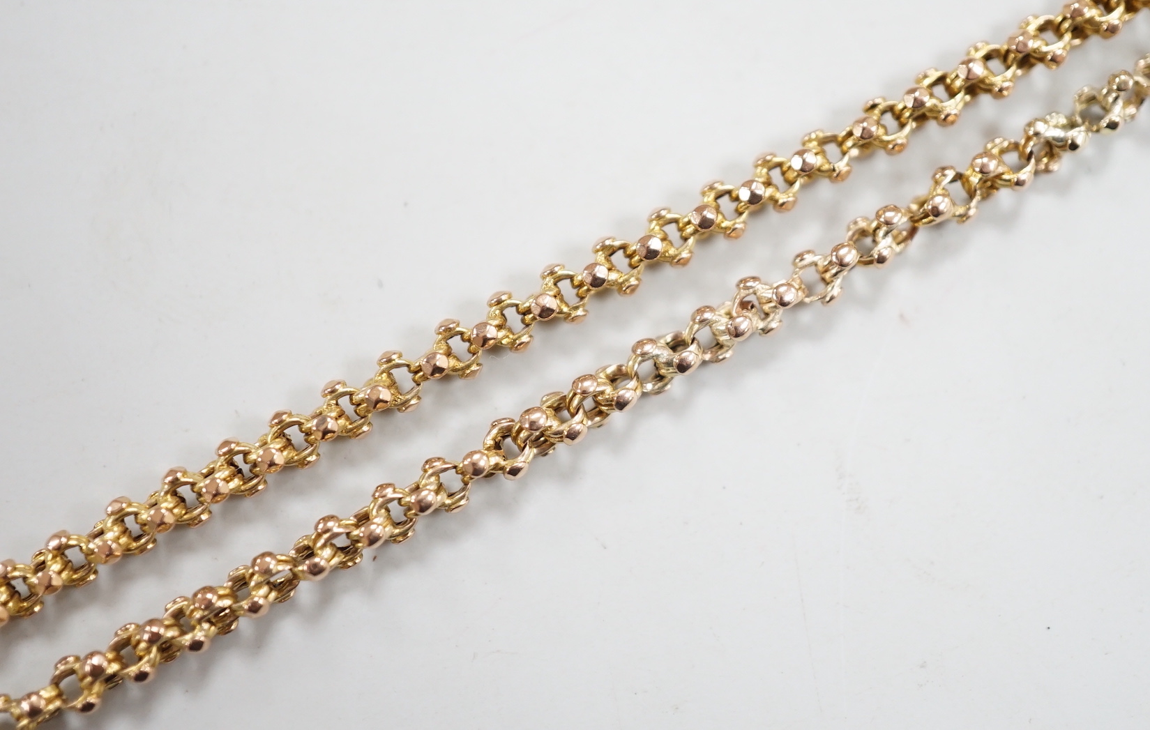 A 9ct gold guard chain, 118cm, 22.3 grams.